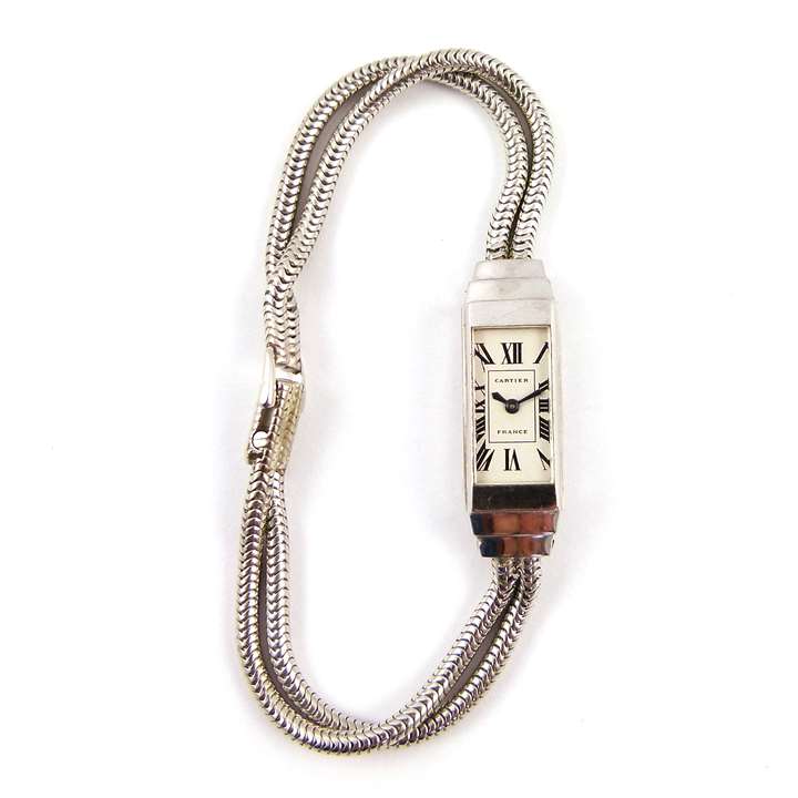 Art Deco platinum lady's rectangular 'Baguette' wristwatch with twin chain bracelet